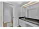 Bathroom with granite countertop and sliding door at 362 Enclave Dr, Lakeland, FL 33803