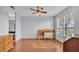 Bedroom with wood floors, ceiling fan, and window at 362 Enclave Dr, Lakeland, FL 33803