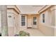 Building entryway with covered porch and tiled flooring at 362 Enclave Dr, Lakeland, FL 33803