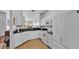 White kitchen with granite countertops and stainless steel appliances at 362 Enclave Dr, Lakeland, FL 33803