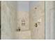 Large walk-in shower with tiled walls and built-in seat at 362 Enclave Dr, Lakeland, FL 33803