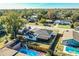 Aerial view showcasing a house with a swimming pool and shed at 408 Patrick Ave, Winter Haven, FL 33880