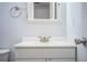 Simple bathroom with vanity and mirror at 408 Patrick Ave, Winter Haven, FL 33880