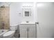 Bright bathroom featuring a shower/tub combo and white vanity at 408 Patrick Ave, Winter Haven, FL 33880