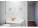 Clean bathroom with updated vanity and mirror at 408 Patrick Ave, Winter Haven, FL 33880