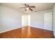 Spacious bedroom with wood flooring and ceiling fan at 408 Patrick Ave, Winter Haven, FL 33880