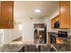 Kitchen features granite countertops and a double sink at 408 Patrick Ave, Winter Haven, FL 33880