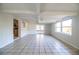 Large living room featuring tile floors and access to a patio at 408 Patrick Ave, Winter Haven, FL 33880