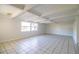 Large living room with tile floors and high ceilings at 408 Patrick Ave, Winter Haven, FL 33880