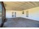 Bright screened porch features concrete floor and access to backyard at 408 Patrick Ave, Winter Haven, FL 33880