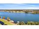 Aerial view of lakefront community with lush landscaping at 4108 Solamor St, Lakeland, FL 33810