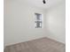 Bright bedroom with carpeted floor and window at 4108 Solamor St, Lakeland, FL 33810