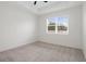 Bright bedroom with carpeted floor and ceiling fan at 4108 Solamor St, Lakeland, FL 33810