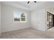 Spacious bedroom with carpeting and access to a bathroom at 4108 Solamor St, Lakeland, FL 33810