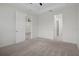 Bright bedroom with carpeting and access to a bathroom at 4108 Solamor St, Lakeland, FL 33810