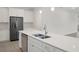 Modern kitchen with white cabinets and island at 4108 Solamor St, Lakeland, FL 33810