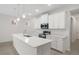 Modern kitchen with white cabinets and stainless steel appliances at 4108 Solamor St, Lakeland, FL 33810