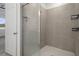 Large walk-in shower with neutral tile at 4108 Solamor St, Lakeland, FL 33810