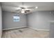 Large bedroom with ceiling fan and a window at 4185 Shearwater St, Lakeland, FL 33811