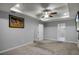 Bright bedroom featuring carpet floors and a ceiling fan at 4185 Shearwater St, Lakeland, FL 33811