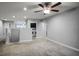 Spacious bonus room with ceiling fan and carpet flooring at 4185 Shearwater St, Lakeland, FL 33811