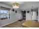 Light-filled dining room, hardwood floors, view of entryway at 4185 Shearwater St, Lakeland, FL 33811