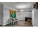 Dining room with wood floors and a decorative wall hanging at 4185 Shearwater St, Lakeland, FL 33811