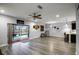 Living room with pool view and sliding doors at 4185 Shearwater St, Lakeland, FL 33811