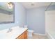 Simple bathroom with a single vanity, toilet, and bathtub at 4225 Shadow Wood Ct, Winter Haven, FL 33880