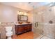 Elegant bathroom with a double vanity and large shower at 4225 Shadow Wood Ct, Winter Haven, FL 33880