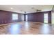 Spacious bedroom with hardwood floors and ceiling fans at 4225 Shadow Wood Ct, Winter Haven, FL 33880