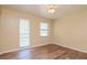 Bedroom with hardwood floors and a ceiling fan at 4225 Shadow Wood Ct, Winter Haven, FL 33880