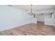 Formal dining room with hardwood floors and elegant chandelier at 4225 Shadow Wood Ct, Winter Haven, FL 33880