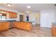 Kitchen with wood cabinets, stainless steel appliances and island at 4225 Shadow Wood Ct, Winter Haven, FL 33880