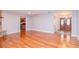 Living room with hardwood floors and view of entryway at 4225 Shadow Wood Ct, Winter Haven, FL 33880