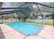 Refreshing screened pool perfect for outdoor enjoyment at 4225 Shadow Wood Ct, Winter Haven, FL 33880