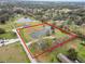 Aerial view showing home's location on a large lot with a pond at 4312 Glenview Dr, Lakeland, FL 33810