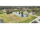 Aerial view showcasing home and pond at 4312 Glenview Dr, Lakeland, FL 33810