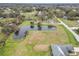 Aerial view showing home, pond, and neighborhood at 4312 Glenview Dr, Lakeland, FL 33810