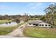 House with pond and driveway, aerial view at 4312 Glenview Dr, Lakeland, FL 33810