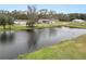 Aerial view of a house with a pond and surrounding land at 4312 Glenview Dr, Lakeland, FL 33810