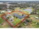 Aerial view of property with pond and surrounding area at 4312 Glenview Dr, Lakeland, FL 33810