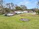 Expansive backyard with fire pit and storage shed at 4312 Glenview Dr, Lakeland, FL 33810