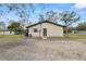 House exterior showcasing a side view and gravel area at 4312 Glenview Dr, Lakeland, FL 33810