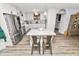 Kitchen island with granite top and metal stools at 4312 Glenview Dr, Lakeland, FL 33810