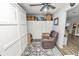 Home office with a murphy bed, built-in storage, and a relaxing chair at 4312 Glenview Dr, Lakeland, FL 33810