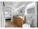 Bathroom with double vanity and toilet at 4481 Pebble Pointe Dr, Lakeland, FL 33813