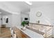 Dining room with rustic wood table and built-in storage at 4481 Pebble Pointe Dr, Lakeland, FL 33813