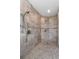 Large walk-in shower with tiled walls at 4481 Pebble Pointe Dr, Lakeland, FL 33813