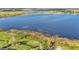 Aerial view of property showcasing lakefront location and surrounding landscape at 4512 Brookshire Pl, Lake Wales, FL 33898